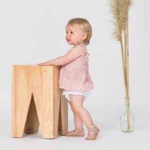 Infant wearing Pretty Brave shoes